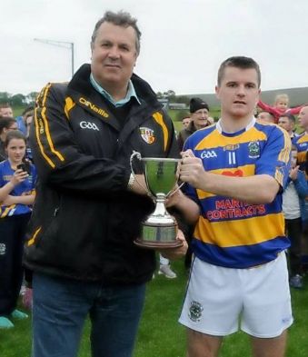 Antrim Chairman Jim Murray presents Declan McKay JHC trophy
