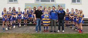 Paddy Kelly receives Sports Volunteer Award from Jonathan Robinson Coleraine Branch Manager of Hughes Insurance