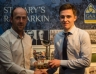 Cathair Mooney recieves the Christy Hardy Trophy for most improved footballer from Stephen Hardy